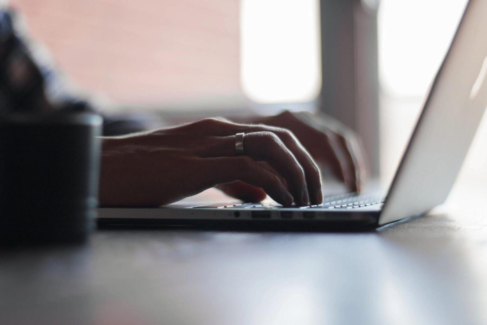 Person Using Laptop Computer